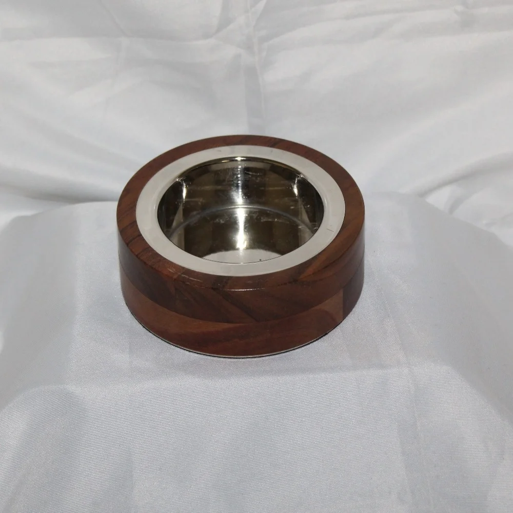 West Elm solid acacia wood bowl with metal alloy bowl in a Silver finish.